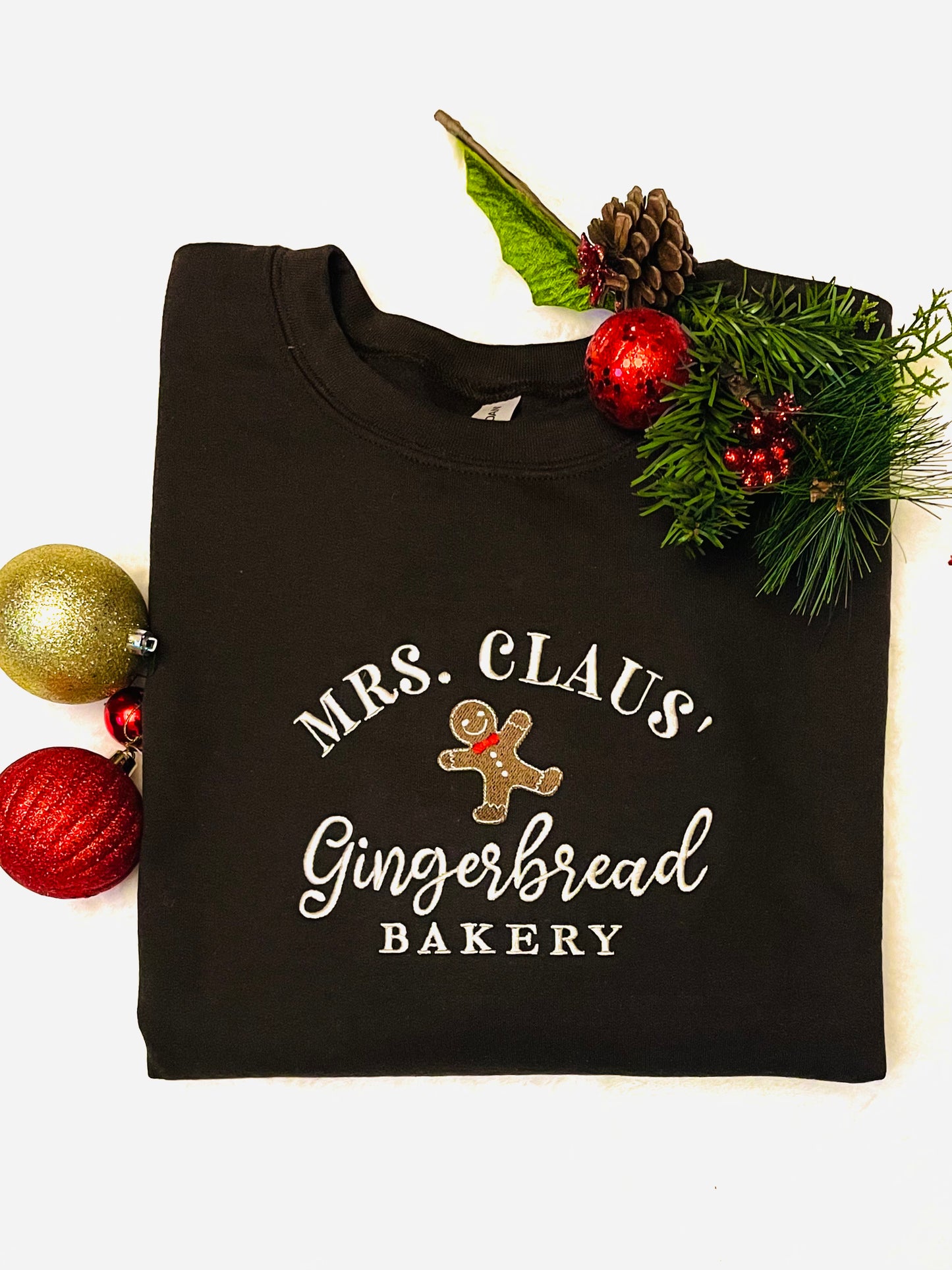 Embroidered Mrs. Claus’ Gingerbread Bakery Crew Neck Sweatshirt